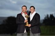 28 September 2014; European team players Graeme McDowell and Rory McIlroy celebrate with the Ryder Cup. The 2014 Ryder Cup, Final Day. Gleneagles, Scotland. Picture credit: Matt Browne / SPORTSFILE