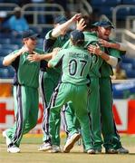 17 March 2007; The Ireland players celebrate with Dave Langford-Smith after he took the wicket of Mohammed Asif, Pakistan. ICC Cricket World Cup, Group D, Ireland v Pakistan, Sabina Park, Kingston, Jamaica. Picture credit: Pat Murphy / SPORTSFILE