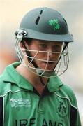17 March 2007; Ireland's Eoin Morgan makes his way back to the pavillion after being caught lbw. ICC Cricket World Cup, Group D, Ireland v Pakistan, Sabina Park, Kingston, Jamaica. Picture credit: Pat Murphy / SPORTSFILE