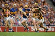 27 September 2014; Kieran Bergin, Tipperary, supported by team-mate Pádraic Maher, in action against Eoin Larkin, right, supported by team-mates Colin Fennelly, extreme left, and John Power, behind. GAA Hurling All Ireland Senior Championship Final Replay, Kilkenny v Tipperary. Croke Park, Dublin. Picture credit: Piaras Ó Mídheach / SPORTSFILE