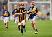 27 September 2014; Aaron Wymberry, St Declan's NS, Waterford City, representing Tipperary, in action against Eoin Morrissey, Shercock NS, Cavan, representing Kilkenny, during the INTO/RESPECT Exhibition GoGames. Croke Park, Dublin. Picture credit: Piaras O Midheach / SPORTSFILE