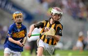 27 September 2014; Cathal Murray, Burrin Rangers Hurling club, Carlow, representing Kilkenny, in action against Niall Duffy, Birdhill NS, Tipperary, representing Tipperary, during the INTO/RESPECT Exhibition GoGames. Croke Park, Dublin. Picture credit: Piaras O Midheach / SPORTSFILE