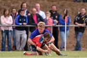 27 September 2014; Jordan O'Regan, Munster, is tackled by Niall O'Neill, Leinster. Under 18 Club Interprovincial, Munster v Leinster. Waterpark RFC, Waterford. Picture credit: Ramsey Cardy / SPORTSFILE
