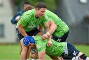 29 September 2014; Connacht's Eoin McKeon is tackled by John Cooney, left, and Craig Ronaldson during squad training ahead of their Guinness Pro 12, Round 5, match against Cardiff Blues on Friday. Connacht Rugby Squad Training, Rosemount, Sportsground, Galway. Picture credit: Barry Cregg / SPORTSFILE