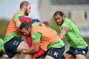 29 September 2014; Connacht's Sean Henry, left, is tackled by JP Cooney, centre, and George Naoupu in action during squad training ahead of their Guinness Pro 12, Round 5, match against Cardiff Blues on Friday. Connacht Rugby Squad Training, Rosemount, Sportsground, Galway. Picture credit: Barry Cregg / SPORTSFILE