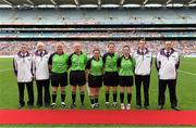 28 September 2014; Referee Maggie Farrelly, 6th from left, with her match officials, including linespeople Leah Mullins and Tracy Brennan, standby referee Terence McShea, 4th official Gerry Carmody, Umpires Martin Farrelly, Maurice Brady, Michael Shiels and Kieran Smith, standby umpire Patrick Farrelly and standby linesperson Martina Dillon. TG4 All-Ireland Ladies Football Senior Championship Final, Cork v Dublin. Croke Park, Dublin. Picture credit: Brendan Moran / SPORTSFILE