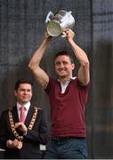 27 September 2014; Kilkenny's David Herity lifts the Liam MacCarthy Cup. All Ireland Hurling Champions return to Kilkenny. Kilkenny Picture credit: Pat Murphy / SPORTSFILE