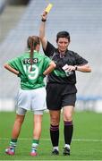 28 September 2014; Referee Mags Doherty shows a yellow card to Maura McDonald, Fermanagh. TG4 All-Ireland Ladies Football Intermediate Championship Final, Down v Fermanagh. Croke Park, Dublin. Picture credit: Brendan Moran / SPORTSFILE