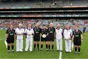 28 September 2014; Referee Mags Doherty, 5th from left, with her match officials ahead of the game, including standby referee Mel Kenny, 4th Official Jonathan Murphy, Umpires Waye Duggan, Christopher McCleane, James Flood, Jim Flood, Linespeople Catherine Murphy and Sarah Stanley. TG4 All-Ireland Ladies Football Intermediate Championship Final, Down v Fermanagh. Croke Park, Dublin. Picture credit: Ramsey Cardy / SPORTSFILE