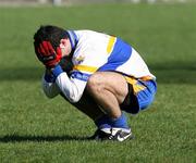 19 March 2007; St. Macartan's Neil McAdam holds his head in his hands after the final whistle. Bank of Ireland MacRory Cup Final, Omagh CBS v St. Macartan's, Monaghan, Casement Park, Belfast, Co. Antrim. Picture credit: Oliver McVeigh / SPORTSFILE