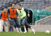 21 March 2007; Republic of Ireland's Robbie Keane in action against Jonathan Douglas during squad training. Croke Park, Dublin. Picture credit: David Maher / SPORTSFILE