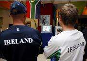 21 March 2007; Ireland players Andre Botha and William Porterfield watch the Pakistan v Zimbabwe game on tv in the hotel lobby. Pegasus Hotel, Kingston, Jamaica. Picture credit: Pat Murphy / SPORTSFILE