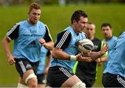 30 September 2014; Munster's Peter O'Mahony in action during squad training ahead of their Guinness PRO12, Round 5, match against Leinster on Saturday. Munster Rugby Squad Training, University of Limerick, Limerick. Picture credit: Diarmuid Greene / SPORTSFILE