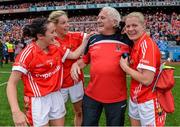 28 September 2014; Cork manager Eamonn Ryan celebrates with  Angela Walsh, left, Geraldine O'Flynn and Deirdre O'Reilly, right, after the game. TG4 All-Ireland Ladies Football Senior Championship Final, Cork v Dublin. Croke Park, Dublin. Picture credit: Brendan Moran / SPORTSFILE