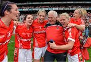 28 September 2014; Cork manager Eamonn Ryan celebrates with from left, Grace Kearney, Geraldine O'Flynn, Angela Walsh, Deirdre O'Reilly and Valerie Mulcahy, after the game. TG4 All-Ireland Ladies Football Senior Championship Final, Cork v Dublin. Croke Park, Dublin. Picture credit: Brendan Moran / SPORTSFILE