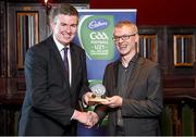 3 October 2014; Derry’s Joe Brolly and Clare’s Anthony Daly were tonight inducted into the Hall of Fame at the 2014 Cadbury Gaelic Writers’ Association Awards at the Jackson Court Hotel in Dublin. In addition, Seamus Hickey was awarded the inaugural Hurling Personality of the Year while Kerry’s All-Ireland winning midfielder, David Moran, received the equivalent football award. This year’s PRO of the Year award went to Tracey Kennedy of Cork while one of the country’s longest-serving GAA journalists, Michael Dundon, was honoured with the Lifetime Achievement Award. Pictured is Joe Brolly, Derry, receiving the award from John Fogarty, left, Chairman of the Gaelic Writers Association. Cadbury Gaelic Writers Association Awards 2014, Jackson Court Hotel, Harcourt Street, Dublin. Picture credit: Brendan Moran / SPORTSFILE