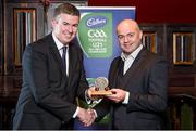 3 October 2014; Derry’s Joe Brolly and Clare’s Anthony Daly were tonight inducted into the Hall of Fame at the 2014 Cadbury Gaelic Writers’ Association Awards at the Jackson Court Hotel in Dublin. In addition, Seamus Hickey was awarded the inaugural Hurling Personality of the Year while Kerry’s All-Ireland winning midfielder, David Moran, received the equivalent football award. This year’s PRO of the Year award went to Tracey Kennedy of Cork while one of the country’s longest-serving GAA journalists, Michael Dundon, was honoured with the Lifetime Achievement Award. Pictured is Anthony Daly, Clare, receiving the award from John Fogarty, left, Chairman of the Gaelic Writers Association. Cadbury Gaelic Writers Association Awards 2014, Jackson Court Hotel, Harcourt Street, Dublin. Picture credit: Brendan Moran / SPORTSFILE