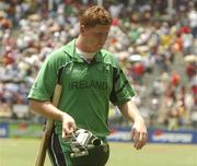23 March 2007; Kevin O'Brien, Ireland, makes his way to the pavillion after being caught out by Ramnaresh Sarwan, West Indies. ICC Cricket World Cup, Group D, Ireland v West Indies, Sabina Park, Kingston, Jamaica. Picture credit: Pat Murphy / SPORTSFILE