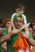 23 March 2007; Ireland supporters David Dwyer, from Dublin, and his 3 year old son Conor show their disapointment after deafeat to the West Indies. ICC Cricket World Cup, Group D, Ireland v West Indies, Sabina Park, Kingston, Jamaica. Picture credit: Pat Murphy / SPORTSFILE
