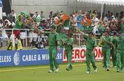 23 March 2007; Ireland palyers, from left, Boyd Rankin, Kyle McCallan, Peter Gillespie, Trent Johnston, and Andrew White salute the fans after defeat to the West Indies. ICC Cricket World Cup, Group D, Ireland v West Indies, Sabina Park, Kingston, Jamaica. Picture credit: Pat Murphy / SPORTSFILE