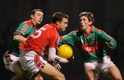 24 March 2007; Kevin O'Sullivan, Cork, in action against Keith Higgins and Liam O'Malley, Mayo. Allianz National Football League, Division 1A, Round 5, Cork v Mayo, Pairc Ui Rinn, Cork. Picture credit: Kieran Clancy / SPORTSFILE