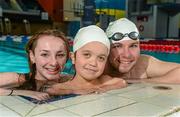 4 October 2014; Irish Paralympic swimmers Ellen Keane and Darragh McDonald with Dylan Prenderville, aged 10, from Clonlara, Co. Clare, at the Paralympics Ireland masterclass event in partnership with sponsors Mondelez at the National Aquatic Centre, Dublin. Leading Irish Paralympic swimmers and coaches were on hand to guide those who may have the potential to compete for Ireland at a future Paralympic Games  through a tailored masterclass training and education session. National Aquatic Centre, Dublin. Picture credit: Barry Cregg / SPORTSFILE