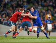 4 October 2014; Mike McCarthy, Leinster, is tackled by Stephen Archer, left, and Duncan Casey, Munster. Guinness PRO12, Round 5, Leinster v Munster. Aviva Stadium, Lansdowne Road, Dublin. Picture credit: Stephen McCarthy / SPORTSFILE