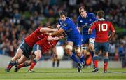 4 October 2014; Mike McCarthy, Leinster, is tackled by Stephen Archer, left, and Duncan Casey, Munster. Guinness PRO12, Round 5, Leinster v Munster. Aviva Stadium, Lansdowne Road, Dublin. Picture credit: Stephen McCarthy / SPORTSFILE