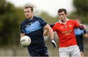 5 October 2014; Colm Murphy, St Judes, in action against Cian Mullins, St Brigids. Dublin County Senior Championship Quarter-Final, St Judes v St Brigids. O'Toole Park, Crumlin, Dublin. Picture credit: Piaras Ó Mídheach / SPORTSFILE