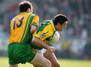 25 March 2007; Aidan O'Mahony, Kerry, in action against Colm McFadden Donegal. Allianz National Football League, Division 1A, Round 5, Donegal v Kerry, Letterkenny, Donegal. Picture credit: Oliver McVeigh / SPORTSFILE