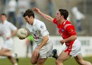 25 March 2007; Ken Donnelly, Kildare, in action against John O'Brien, Louth. Allianz National Football League, Division 1B, Round 5, Kildare v Louth, Newbridge, Co. Kildare. Picture credit: David Maher / SPORTSFILE