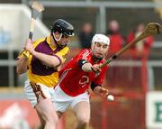 25 March 2007; Darren Stamp, Wexford, in action against Timmy McCarthy, Cork. Allianz National Hurling League, Division 1A, Round 4, Cork v Wexford, Pairc Uí Chaoimh, Cork. Picture credit: Matt Browne / SPORTSFILE