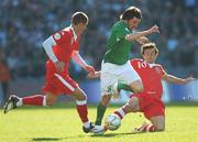 24 March 2007; Jonathan Douglas, Republic of Ireland, in action against Carl Robinson, left, and Simon Davies, Wales. 2008 European Championship Qualifier, Republic of Ireland v Wales, Croke Park, Dublin. Picture credit: Brian Lawless / SPORTSFILE