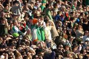 24 March 2007; Republic of Ireland fans shield their eyes from the sun. 2008 European Championship Qualifier, Republic of Ireland v Wales, Croke Park, Dublin. Picture credit: Brian Lawless / SPORTSFILE