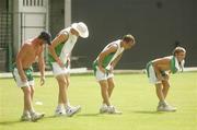 28 March 2007; Ireland's, from left, John Mooney, Boyd Rankin, Kenny Carroll and William Porterfield stretch during team training. The Bourda Grounds, Georgetown, Guyana. Picture credit: Pat Murphy / SPORTSFILE