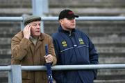 28 March 2007; Tipperary hurling manager Babs Keating and his son Michael watch the match. Allianz National Hurling League, Division 1B, Round 2, Casement Park, Belfast, Co. Antrim. Picture credit: Russell Pritchard / SPORTSFILE