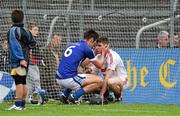5 October 2014; Crusheen goalkeeper Donal Tuohy is consoled by Cratloe's Conor Ryan after the game. Clare County Senior Hurling Championship Final, Cratloe v Crusheen. Cusack Park, Ennis, Co. Clare. Picture credit: Diarmuid Greene / SPORTSFILE