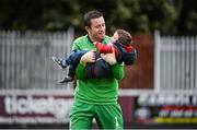 5 October 2014; Zac Clarke, aged 2, with his father, the St Patrick's Athletic goalkeeper, Brendan at the end of the game. FAI Ford Cup, Semi-Final, St Patrick’s Athletic v Finn Harps. Richmond Park, Dublin. Picture credit: David Maher / SPORTSFILE