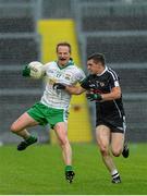 5 October 2014; David McEntee, Burren St Marys, in action against Daryl Branagan, Kilcoo Eoghain Rua. Down County Senior Football Championship Final, St Marys v Kilcoo Eoghain Rua. Páirc Esler, Newry. Picture credit: Oliver McVeigh / SPORTSFILE