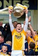 5 October 2014: Clontibret captain Conor McManus lifts the Mick Duffy cup. Monaghan County Senior Club Football Championship Final, Clontibret O'Neills GAA v Scotstown, St Tiernach's Park, Clones, Co. Monaghan. Picture credit: Philip Fitzpatrick / SPORTSFILE