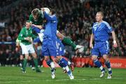 28 March 2007; Kevin Doyle, Republic of Ireland, shoots to score his side's first goal despite the attentons of Slovakia's Martin Skrtel. 2008 European Championship Qualifier, Republic of Ireland v Slovakia, Croke Park, Dublin. Picture credit: Brian Lawless / SPORTSFILE