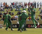 30 March 2007; Boyd Rankin, Ireland, celebrates with his team-mates after he bowled out England's Ed Joyce for 1 run. ICC Cricket World Cup 2007, Super 8, Ireland v England, Guyana National Stadium, Georgetown, Guyana. Picture credit: Pat Murphy / SPORTSFILE