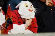 30 March 2007; Munster rugby fan Keith 'Buster' Mooney, from Cork City, shows his dissapointment at the half time score. Heineken Cup Quarter-Final, Llanelli Scarlets v Munster, Stradey Park, Llanelli, Wales. Picture credit: Matt Browne / SPORTSFILE