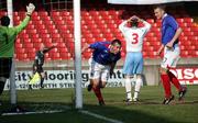 31 March 2007; Mark Dickson, Linfield, turns to celebrate his side's second goal, as Craig McClean, Ballymena United, no.3, holds his head in his hands. JJB Sports Irish Cup Quarter-final Replay, Linfield v Ballymena United, Windsor Park, Belfast, Co. Antrim. Picture credit: Oliver McVeigh / SPORTSFILE
