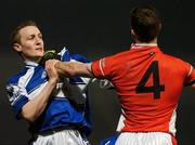 31 March 2007; Peter O'Leary, Laois, has his jersey pulled by Armagh corner-back Finnian Moriarty. Allianz National Football League, Division 1A Round 6, Laois v Armagh, O'Moore Park, Portlaoise,  Co. Laois. Picture credit: Ray McManus / SPORTSFILE