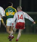 31 March 2007; Colm McCullagh, Tyrone, kicks out at Paul Galvin, Kerry, for which he was shown a straight red card by referee Pat McGovern. Allianz National Football League, Division 1A Round 6, Kerry v Tyrone, Austin Stack Park, Tralee, Co. Kerry. Picture credit: Brendan Moran / SPORTSFILE