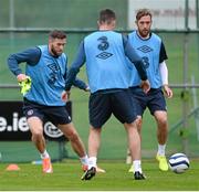 8 October 2014; Republic of Ireland's Daryl Murphy, left, with Richard Keogh, right, in action during squad training ahead of their UEFA EURO 2016 Championship Qualifer, Group D, game against Gibraltar on Saturday. Republic of Ireland Squad Training, Gannon Park, Malahide, Co. Dublin. Picture credit: David Maher / SPORTSFILE