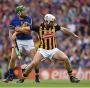 27 September 2014; Michael Fennelly, Kilkenny, is held by James Woodlock, Tipperary, as they contest possession. GAA Hurling All Ireland Senior Championship Final Replay, Kilkenny v Tipperary. Croke Park, Dublin. Picture credit: Brendan Moran / SPORTSFILE