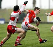 11 March 2007; Finnian Moriarty, Armagh, in action against Joe Keenan, Derry. Allianz National Football League, Division 1B Round 4, Armagh v Derry, Oliver Plunkett Park, Crossmaglen, Co. Armagh. Picture credit: Oliver McVeigh / SPORTSFILE