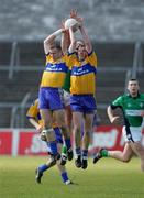 1 April 2007; Clares Ger Quinlan and Stephen Hickey contest a high ball with London's Senan Hehir. Allianz National Football League, Division 2A Round 5, Clare v London, Cusack Park, Ennis, Co. Clare. Picture credit: Kieran Clancy / SPORTSFILE